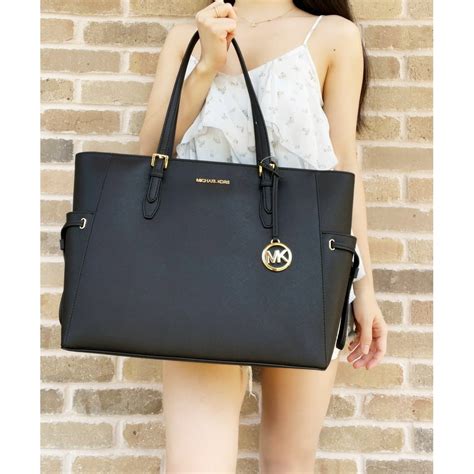 michael kors top zipper tote|Michael Kors large travel tote.